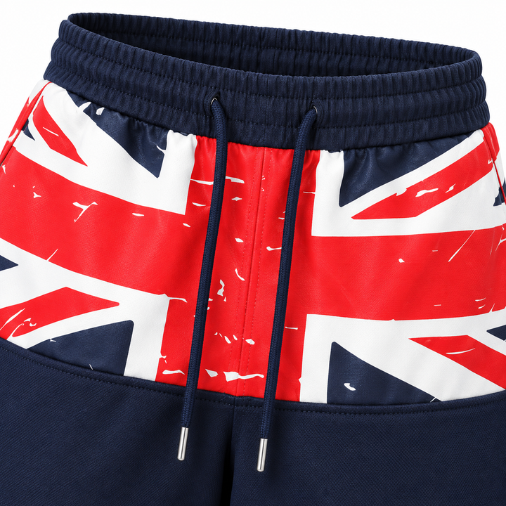 Close-up of navy sweatpants elastic waist, drawstrings and flag print