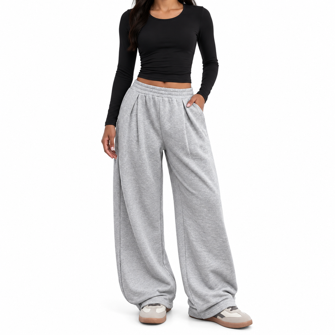 Front view of gray pants with elastic waist and side pockets
