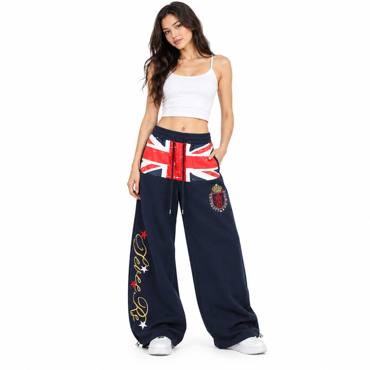 Second model wearing navy flag print wide leg sweatpants