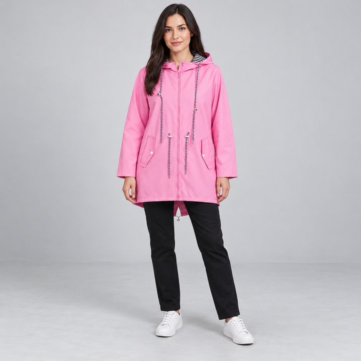 Full-body model wearing a pink hooded zip-front windbreaker.
