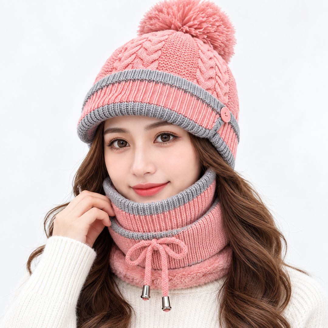 Pink winter hat set for women with gray trim, knitted pom-pom beanie, matching face cover and neck warmer on model