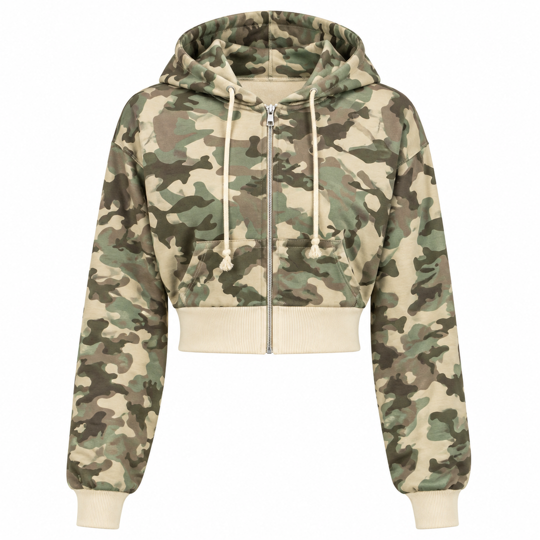 Cropped camouflage zip hoodie with hood, cream ribbed hem and cuffs shown front view on a clean white studio background.