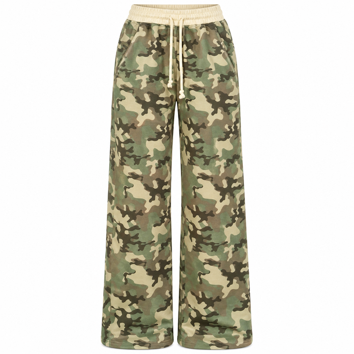 Wide-leg camouflage sweatpants with cream elastic waistband and drawstring shown front view on a clean white studio background.