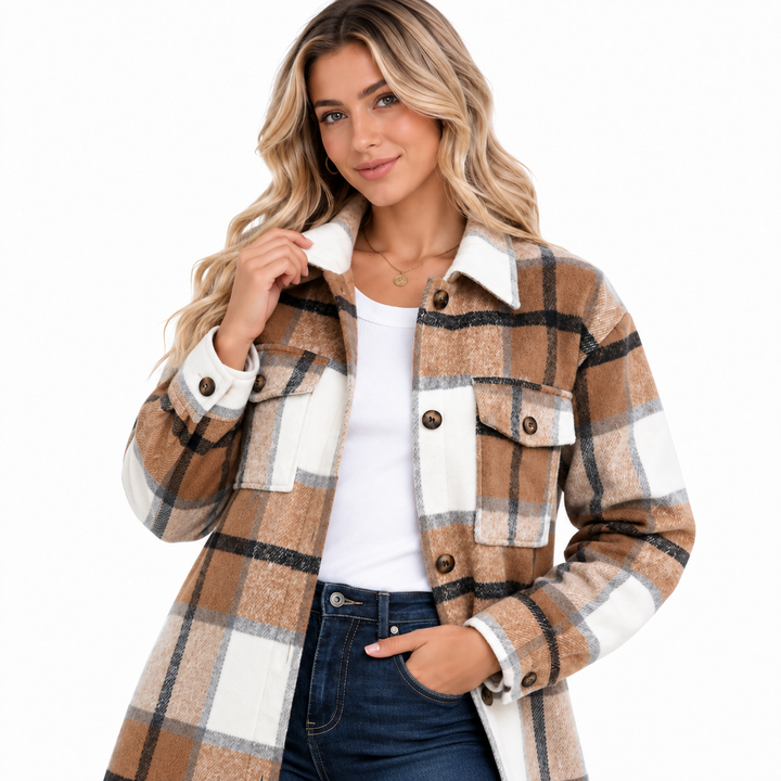 Women shacket upper body detail with model touching the collar, showing chest pockets, buttons, cuffs and plaid texture on white.