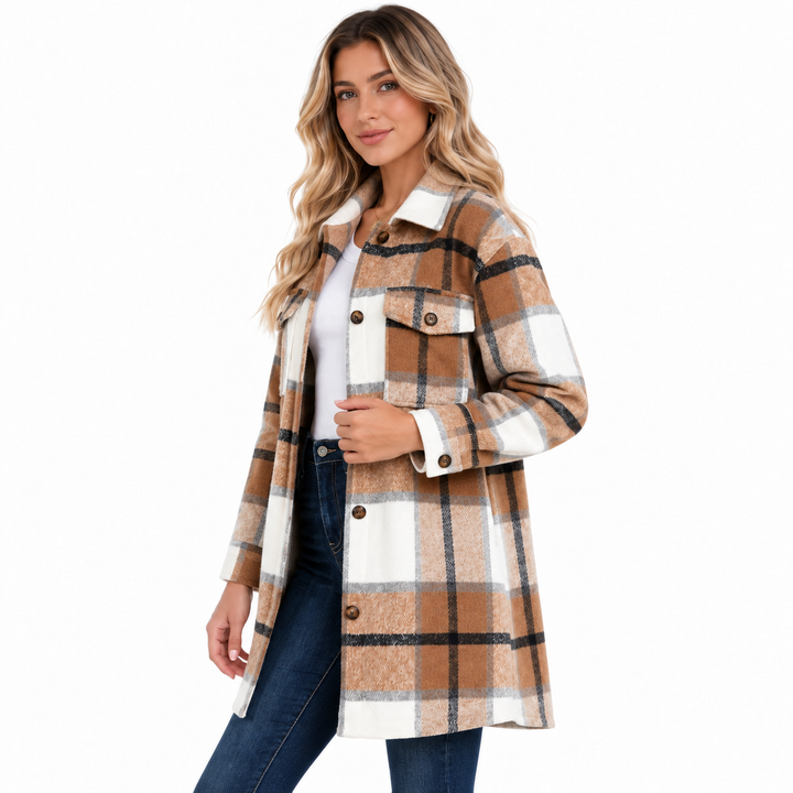 Women shacket three quarter side view showing plaid pattern, longline shape, button front and sleeve cuff detail on white.