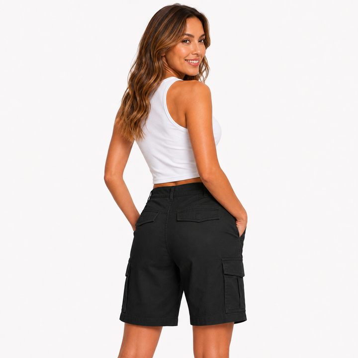 Black multi-pocket shorts on female model from the back, showing rear silhouette, waistband and visible seam details clearly.