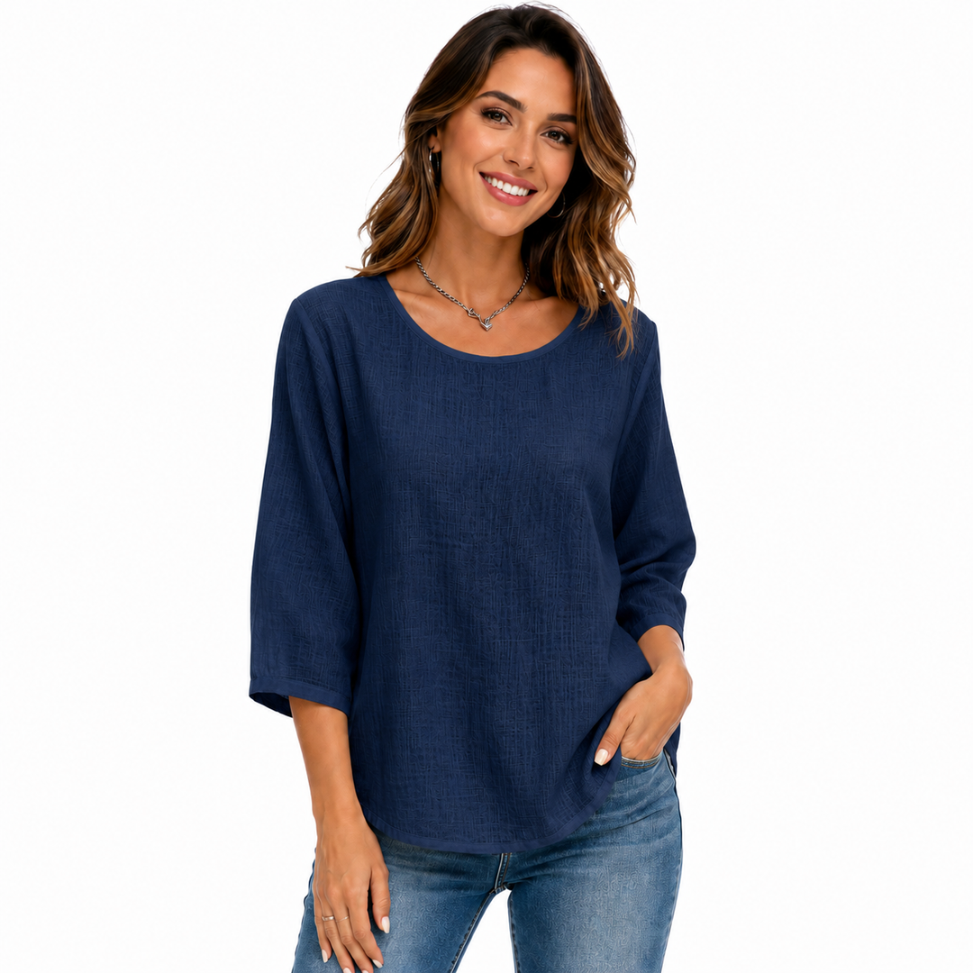 Navy blue casual crew neck top with three-quarter sleeves and relaxed silhouette, displayed clearly for clear product detail.