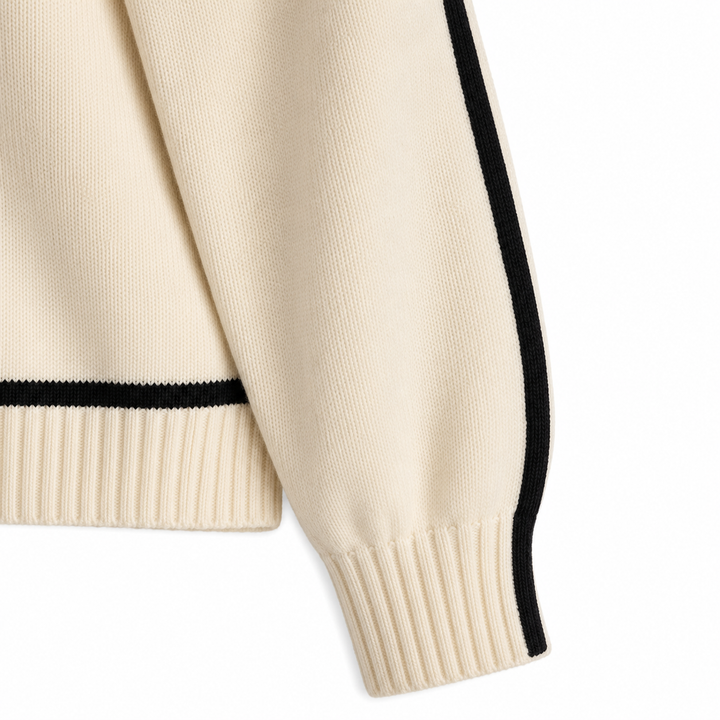 Close-up of ribbed cuff and black sleeve trim on women&