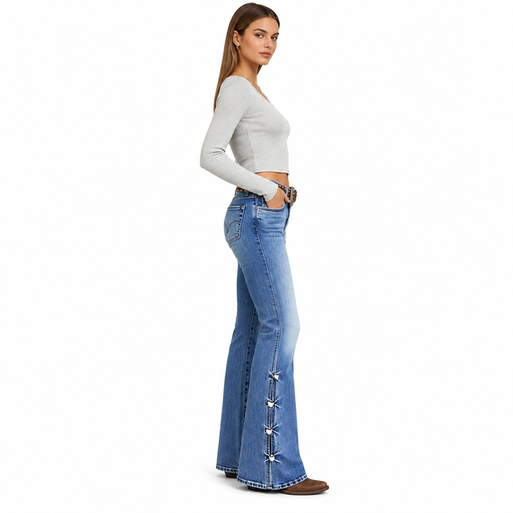 High rise flare jeans on model in side profile with decorative side ties
