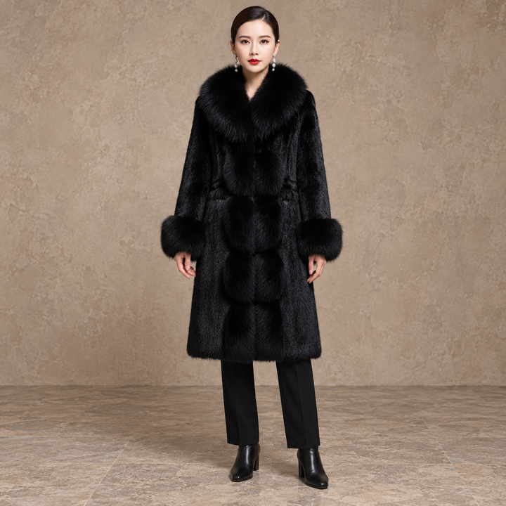 Black long-sleeve coat with wide pile collar, cuffs and front panels, shown full length on a model.