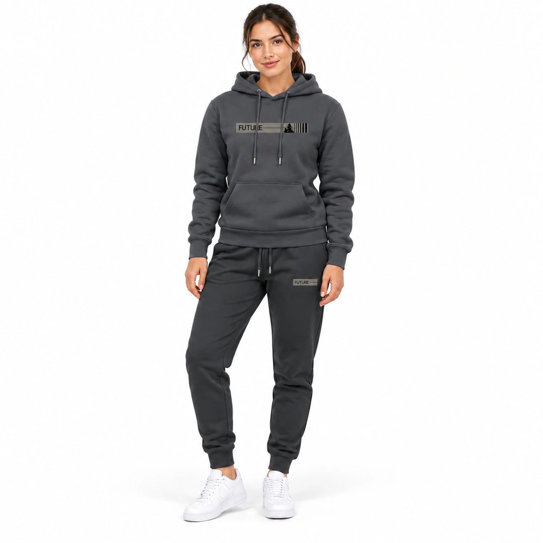 Woman wearing the dark charcoal-gray hoodie and matching pants set on a white background