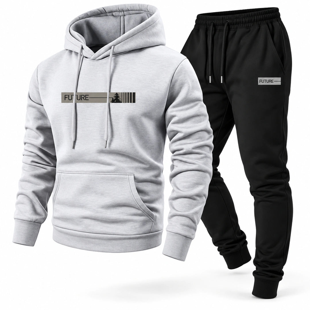 Three-quarter studio view of the light gray hoodie and black pants set