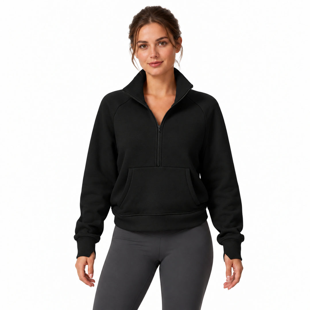 Woman wearing the Advanced Black half-zip fleece pullover, front view on a white background.