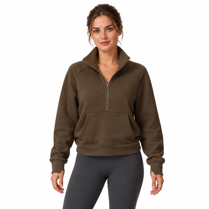 Woman wearing the Jiaocha Coffee brown half-zip fleece pullover, front view on a white background.