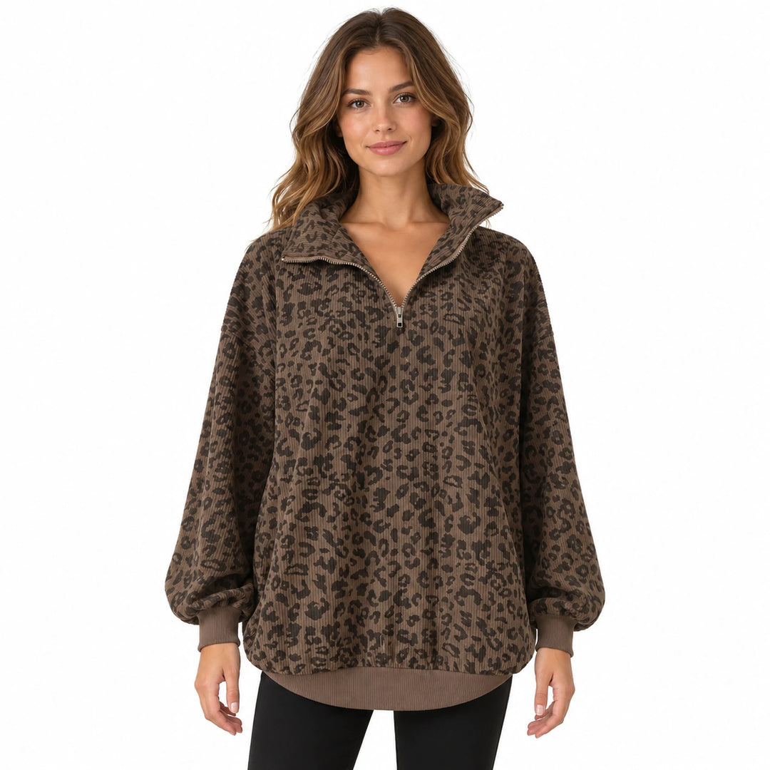 Adult model wearing a coffee-brown leopard print quarter zip pullover with a loose drape