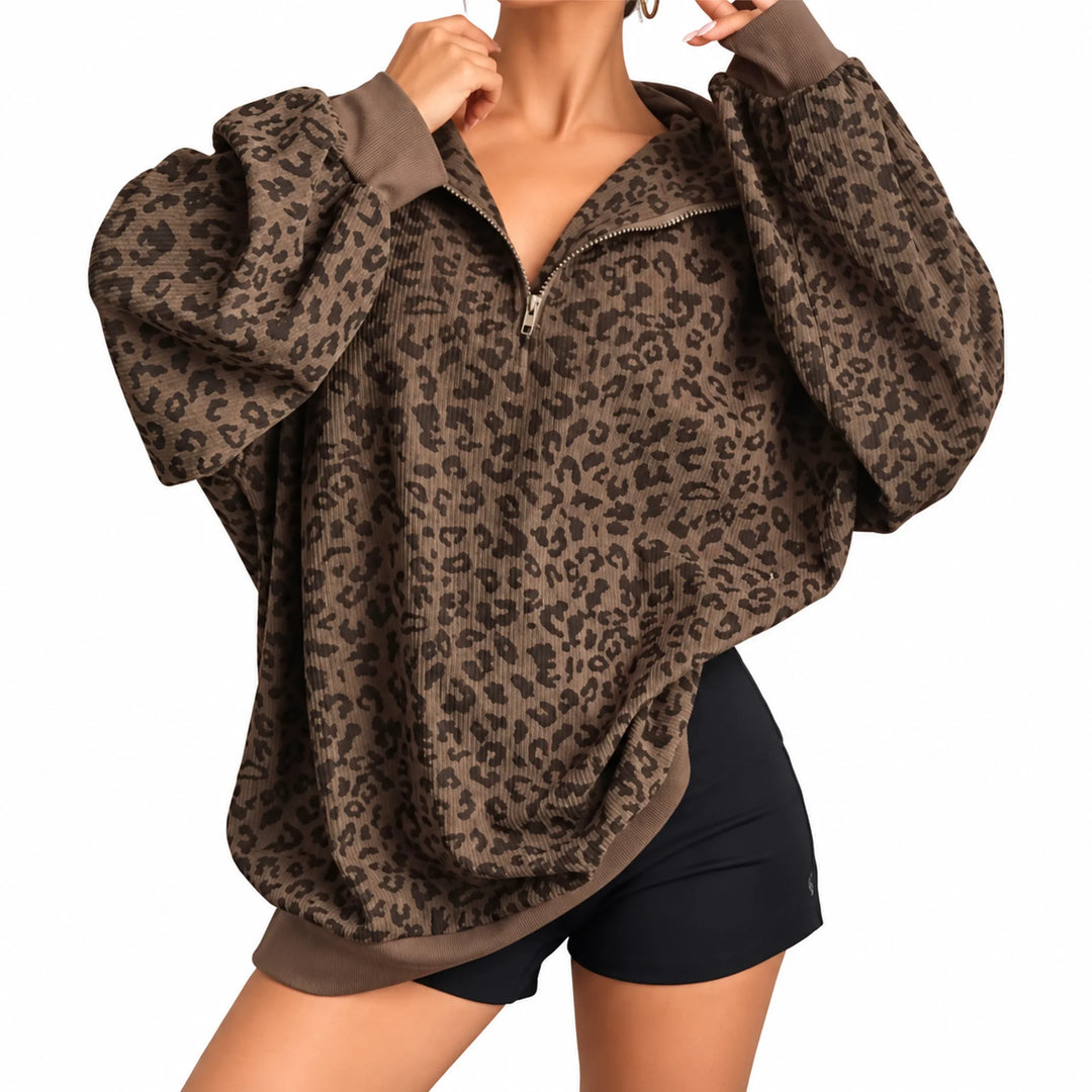 Coffee-brown leopard quarter zip pullover shown on an adult model at a slight angle