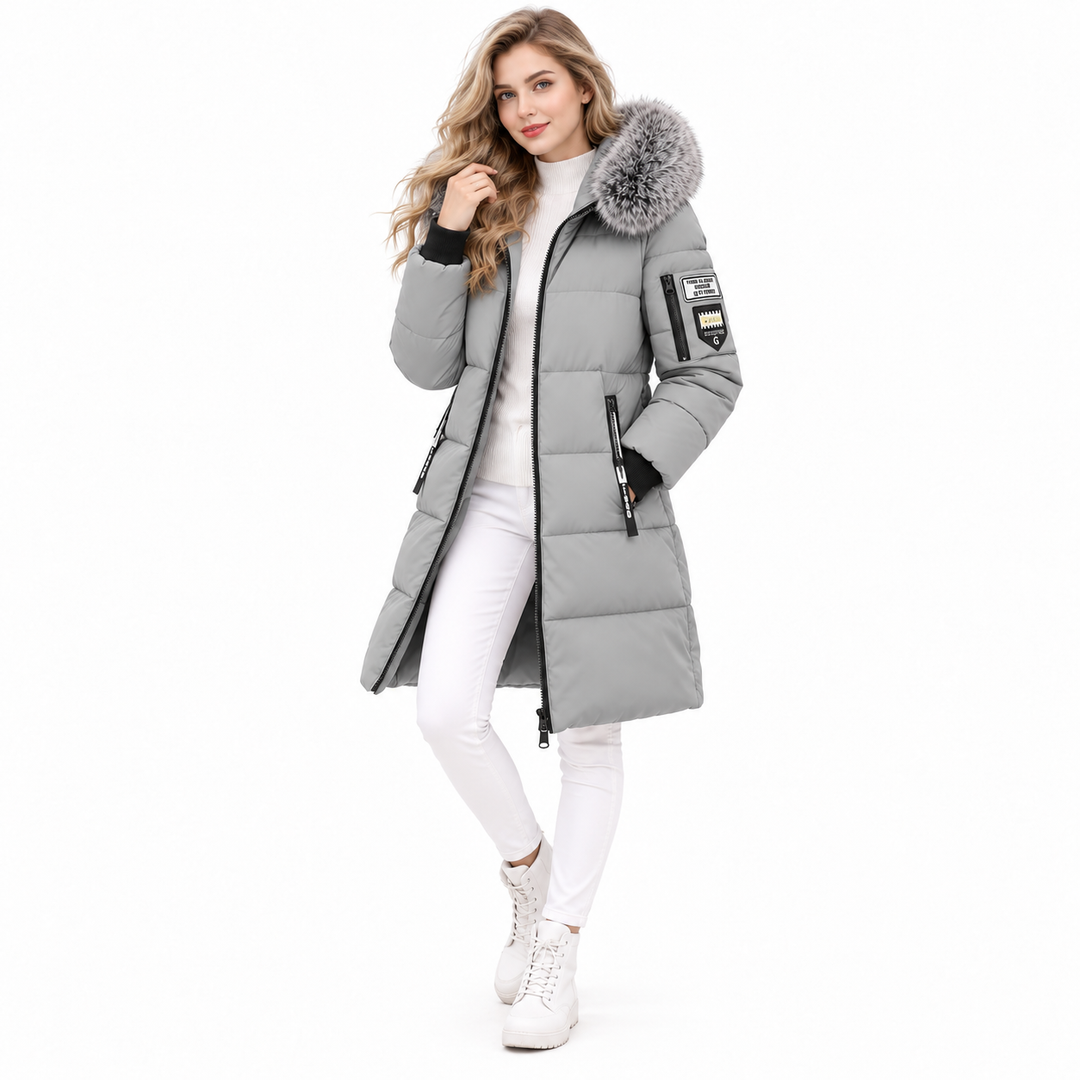 Gray long puffer coat with fur-trim hood on model
