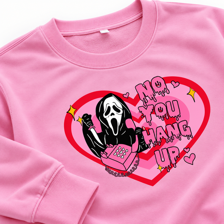 Pink love print sweatshirt close-up showing neckline, print and stitching