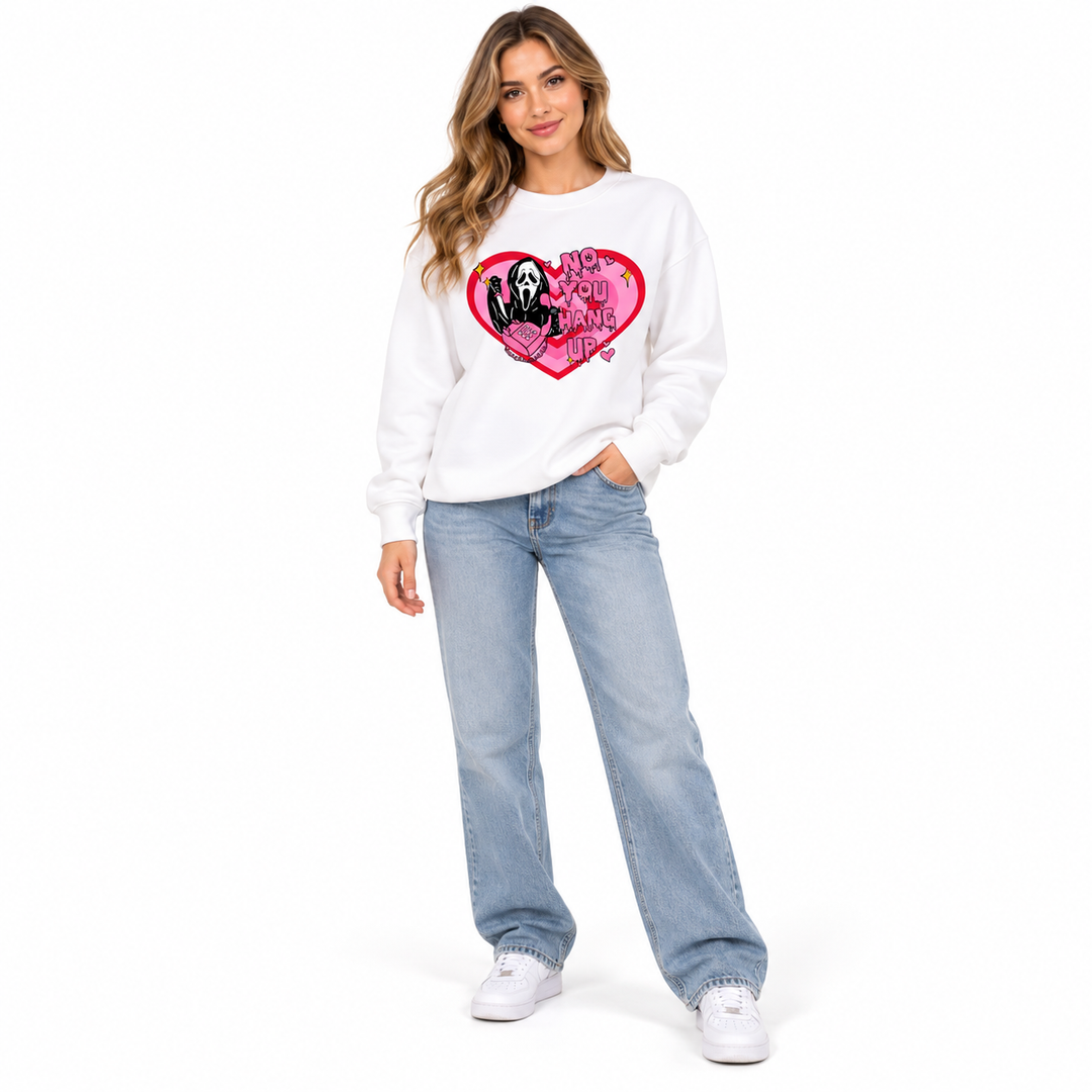 Women's love print sweatshirt in white on full-body model, front view
