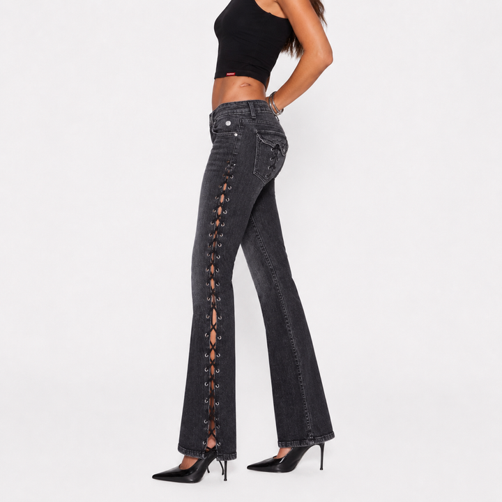 Bootcut jeans side fit view on female model showing the low-rise waist and relaxed straight-to-bootcut for product selection.