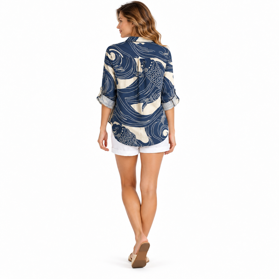 Navy fish and wave printed blouse on full-body model, back view
